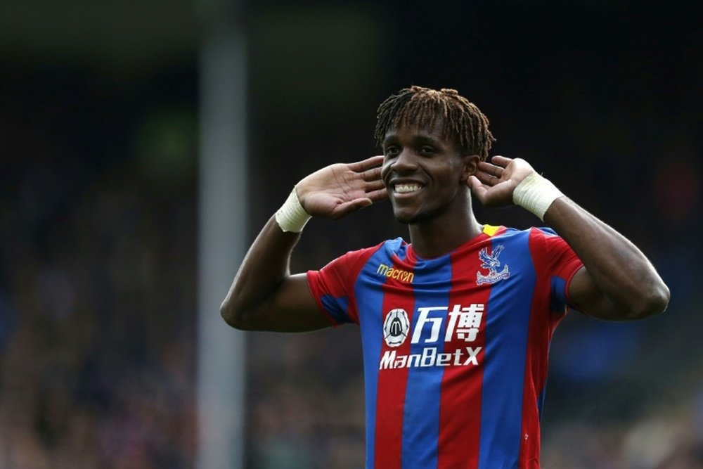 Zaha's fine form has him linked to transfer rumours. AFP