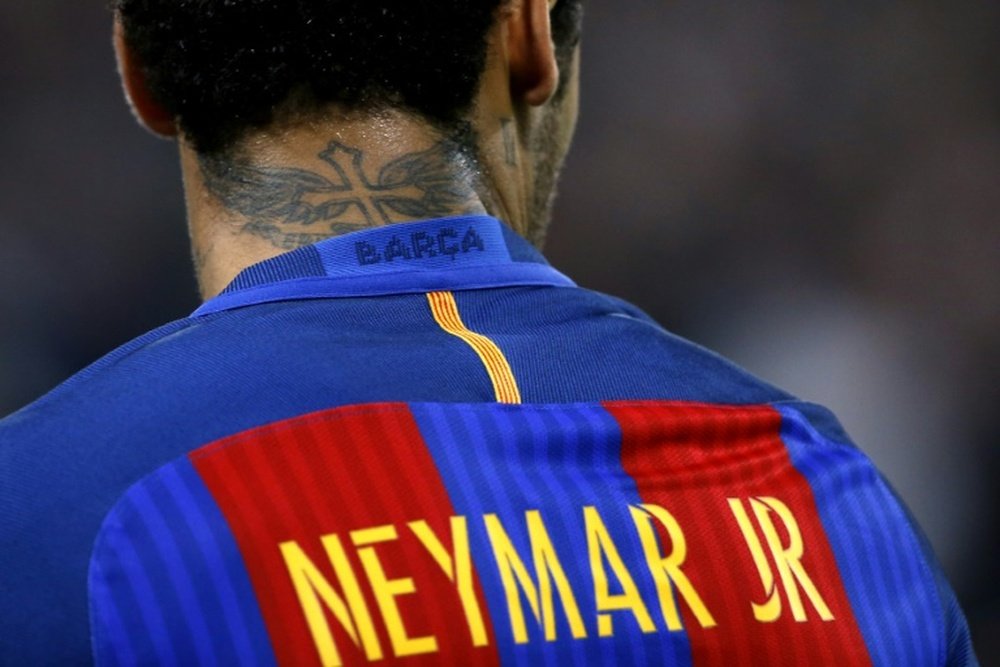 Jogadores do Barça colocaram dinheiro por Neymar. AFP
