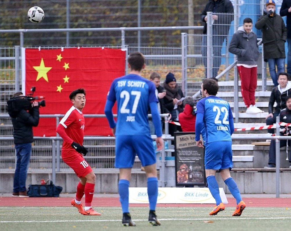 Sun Weizhe in action for China's Under-20 side. AFP