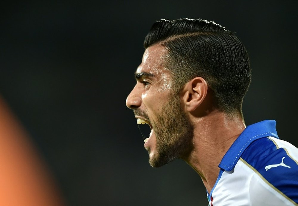 Italys forward Graziano Pelle (C) celebrates after scoring during the Euro 2016 group H qualifying football match between Italy and Malta on September 3, 2015 at the Artemio Franchi stadium in Florence