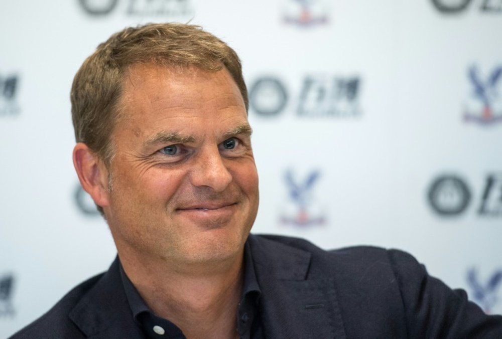 I'm not the first coach to lose on debut – Netherlands boss De Boer. AFP
