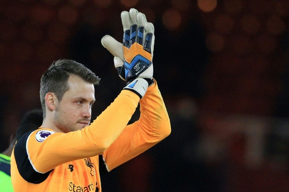 Liverpools goalkeeper Simon Mignolet applauds the fans following their English Premier League match against Middlesbrough, at Riverside Stadium in Middlesbrough, on December 14, 2016