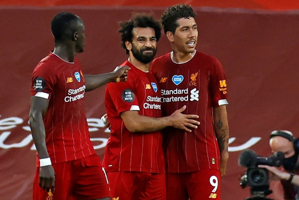 Mane, Salah e Firmino devem estar entre os titulares do Liverpool. AFP