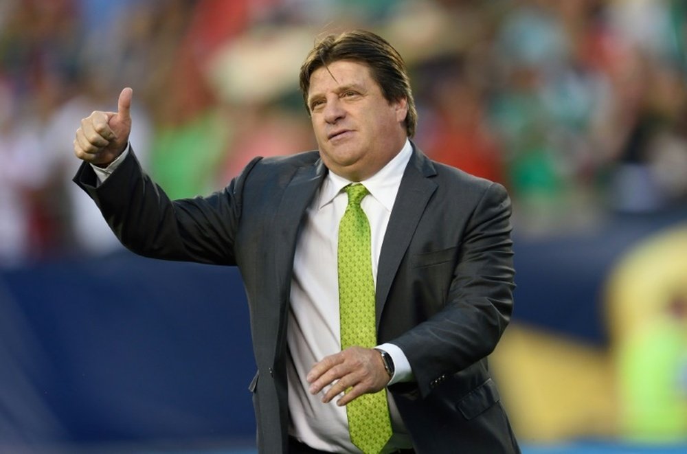 Miguel Herrera gives a thumbs up as he walks onto the field before the 2015 CONCACAF Gold Cup final between Jamaica and Mexico in Philadelphia on July 26, 2015