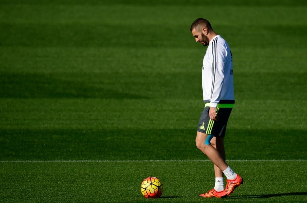 Real Madrids French forward Karim Benzema, pictured on November 7, 2015, has been charged withÂ complicity to blackmail and conspiring to commit a criminal act