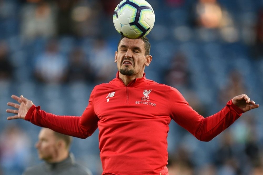 Lovren is being linked with a move to Serie A. AFP