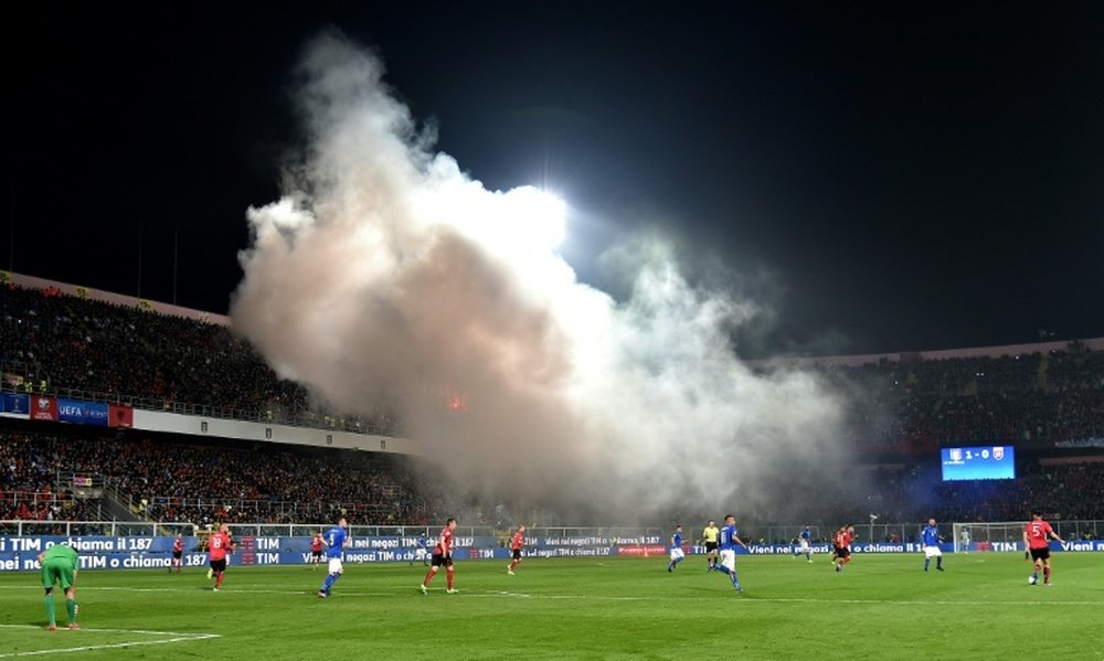 Flares can't halt Italy as Immobile helps down Albania in World Cup qualifier. AFP