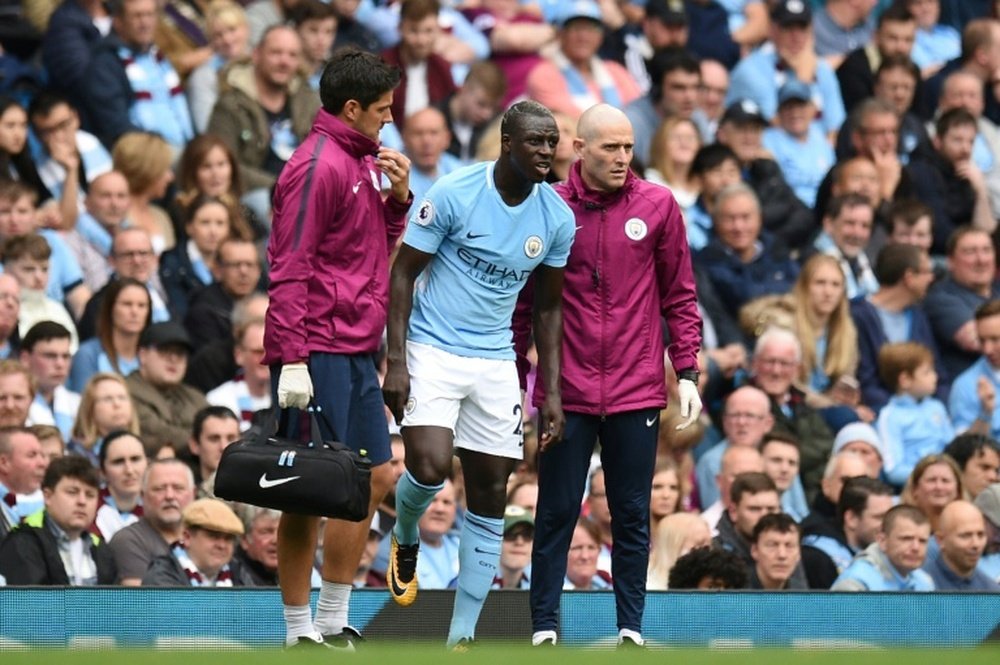 Mendy limped off in the win over Palace. AFP