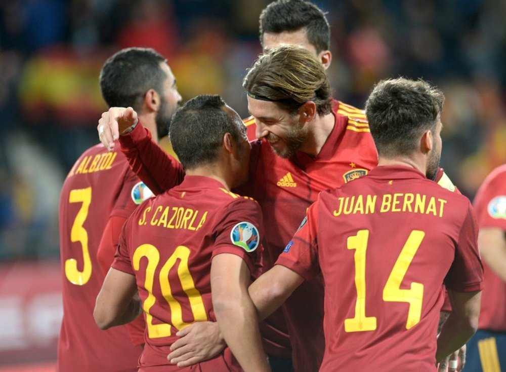 Spain have qualified. AFP