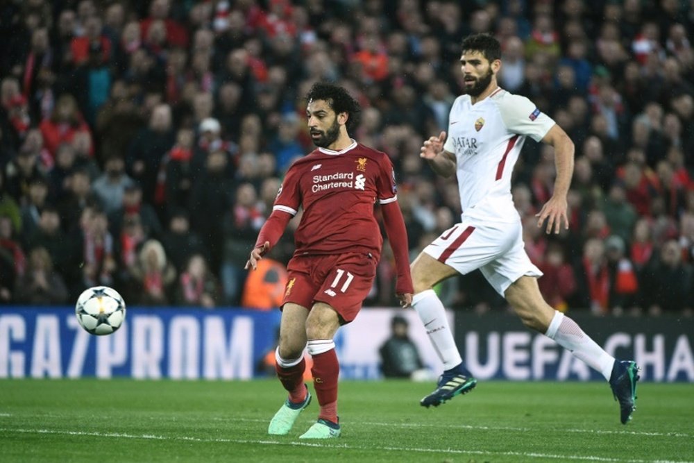 Mo Salah came back to haunt his former club, scoring twice in the first leg of the tie. AFP