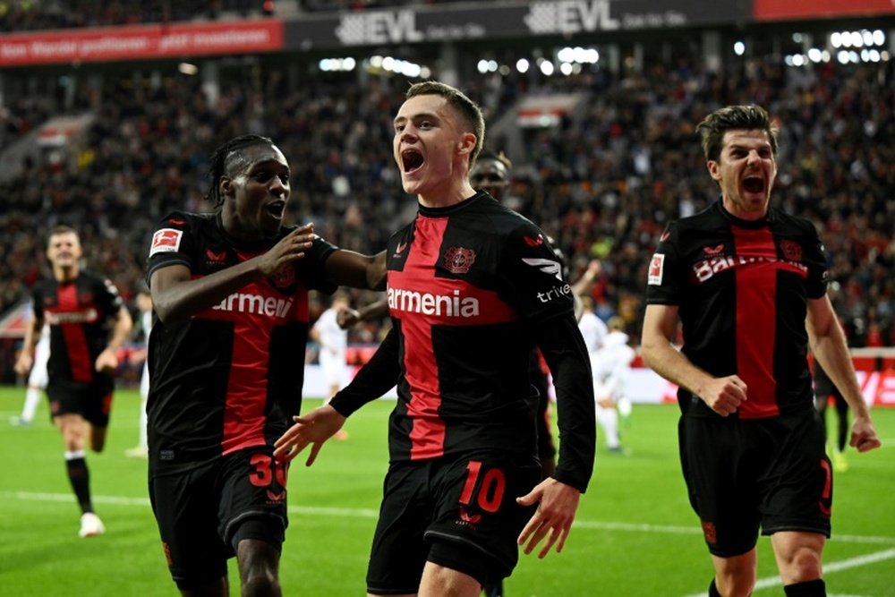 Bayer Leverkusen's Florian Wirtz (C) scored his second goal of the season. AFP