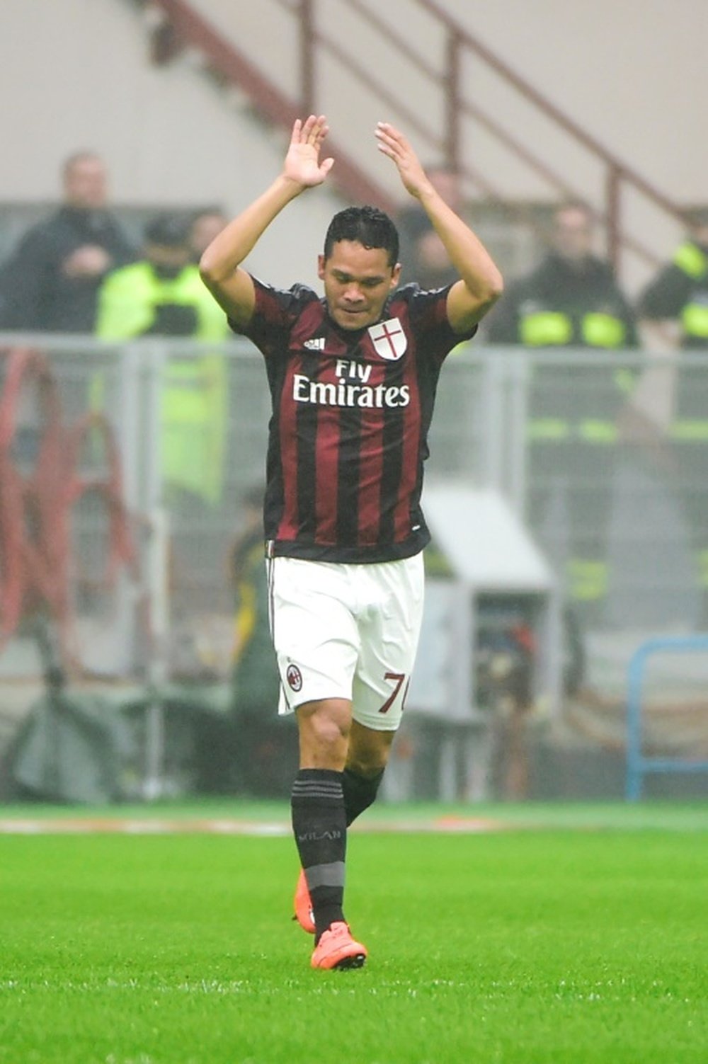 AC Milan forward Carlos Bacca celebrates the match's result: Sassuolo 0 AC Milan 1. AFP