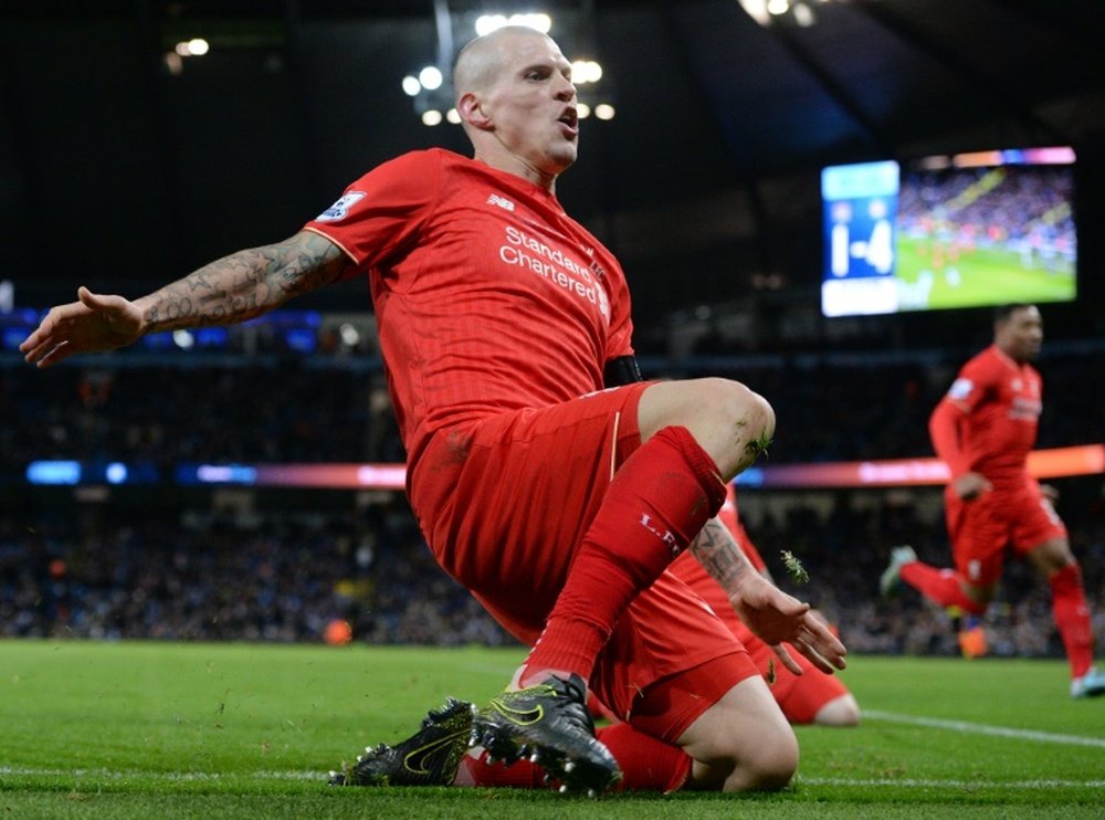 Liverpools Martin Skrtel, pictured on November 21, 2015, limped off in the first half of Liverpools 3-0 defeat at Watford and scans have revealed the Slovakia centre-back has a torn hamstring that will keep him out until February