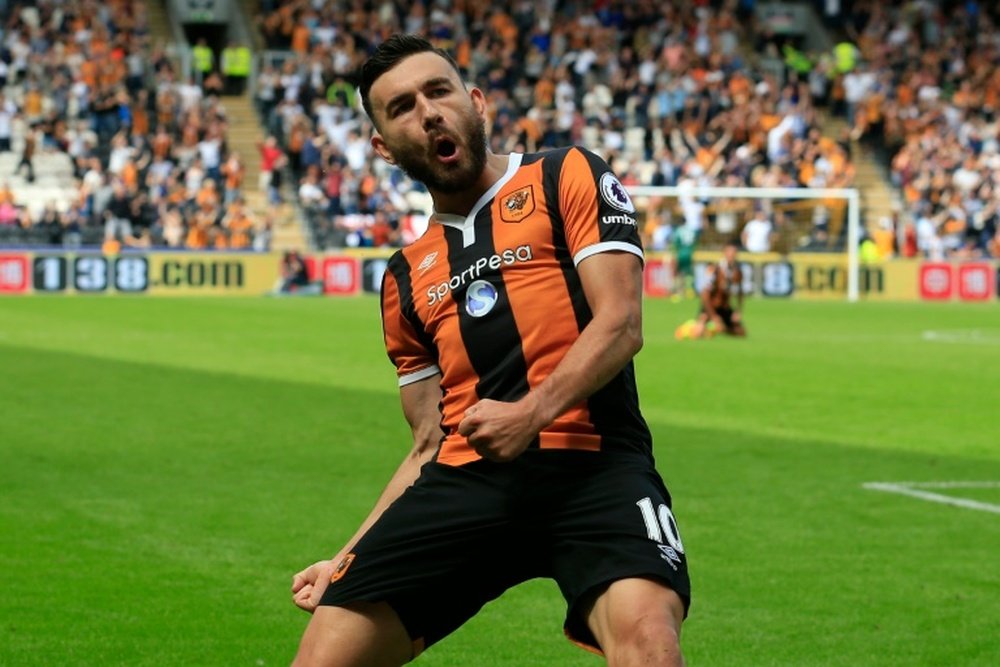 Snodgrass celebrates scoring for Hull City against Leicester on the opening day of the season. AFP