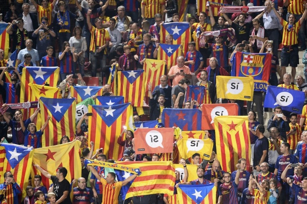 These scenes are common at Barcelona matches. AFP