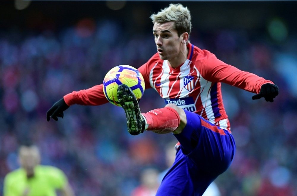 An in-form Griezmann will travel to Stamford Bridge on Tuesday in the Champions League. AFP