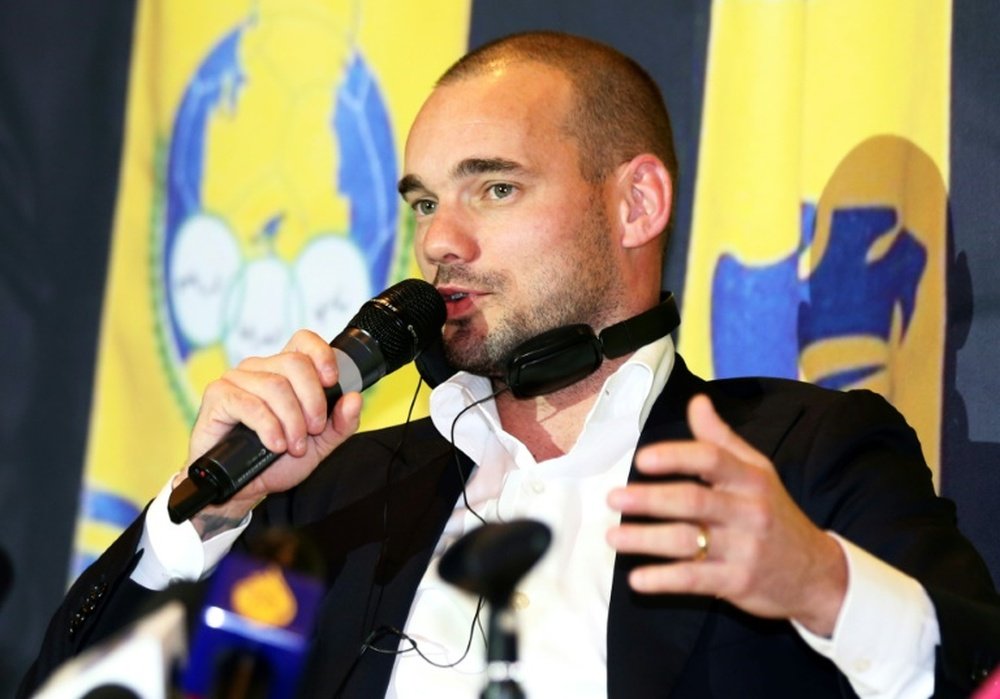 Sneijder was officially unveiled by Al Gharafa in Doha on Monday. AFP