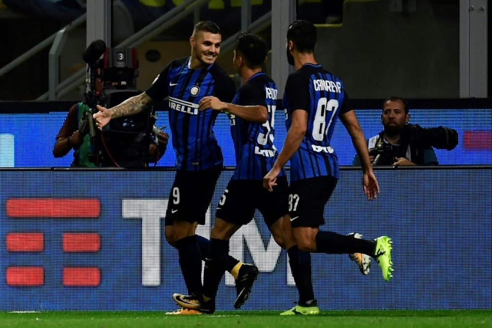 Icardi was the star man for Inter, scoring a hat-trick in the 3-2 victory over AC Milan. AFP