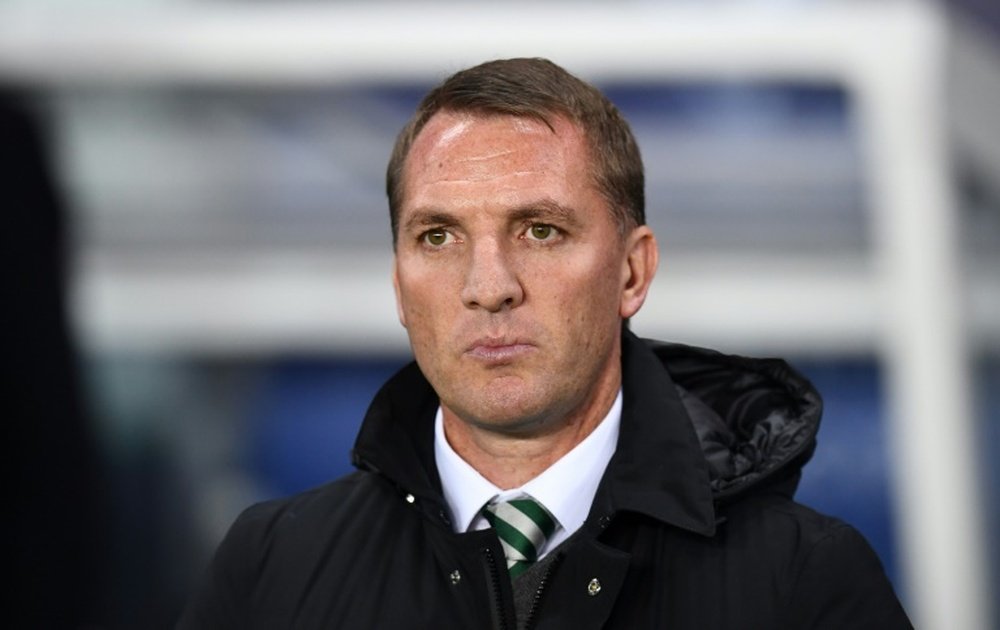 Brendan Rodgers has defended the Celtic fans who have been accused of racial abuse. AFP
