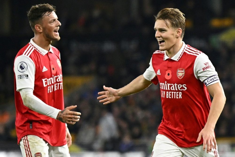 Martin Odegaard (R) was the hero for Arsenal. AFP