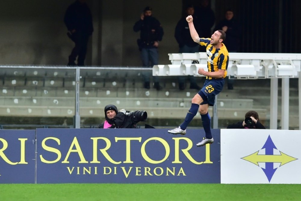 Hellas Veronas midfielder Artur Ionita celebrates after scoring during an Italian Serie A football match in Verona on Febrauary 7, 2016