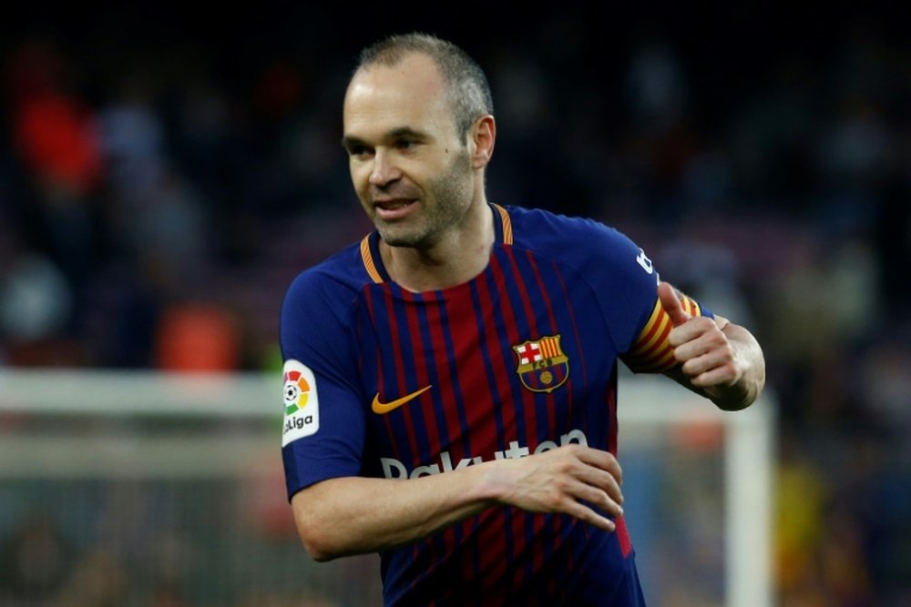 Iniesta is likely to ply his trade in Asia next year. AFP