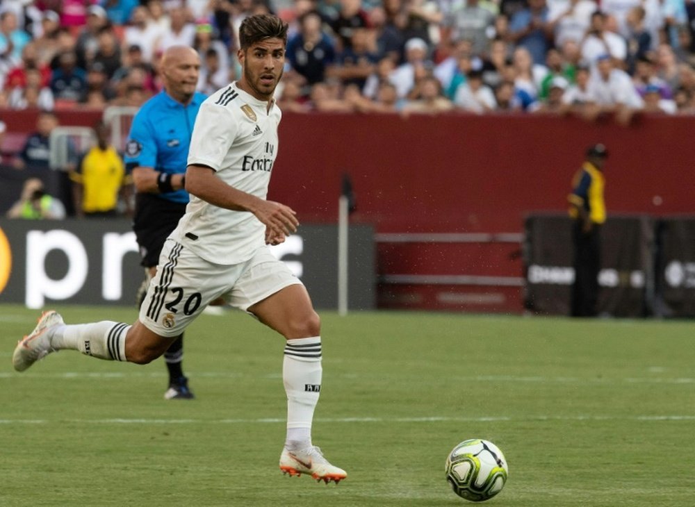 Marco Asensio fue fundamental en el segundo gol 'merengue'. AFP/Archivo