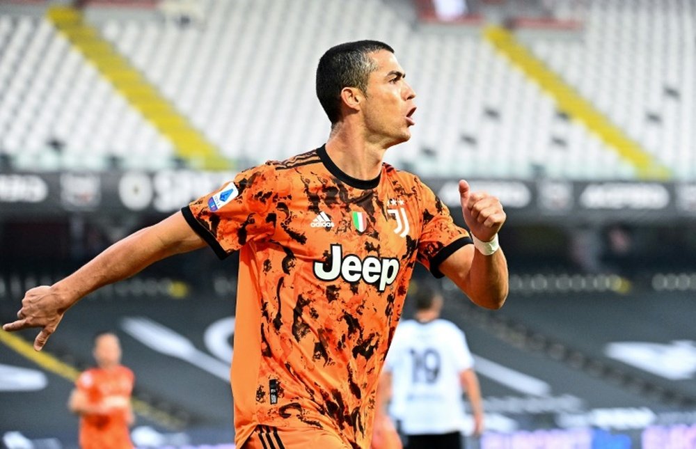 Berbatov talked about Cristiano's commitment. AFP