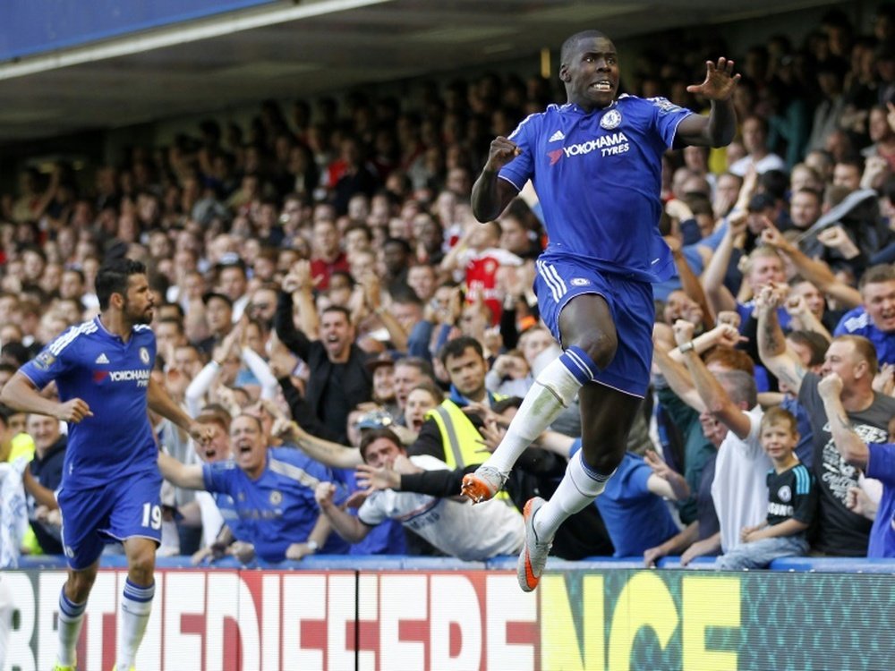 Chelseas Kurt Zouma (R) celebrates after scoring the opening goal of the Premier League match against Arsenal at Stamford Bridge on September 19, 2015