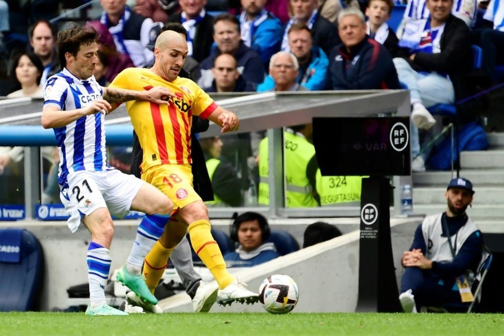 Xavi wants Barca to up the effort for Romeu. AFP