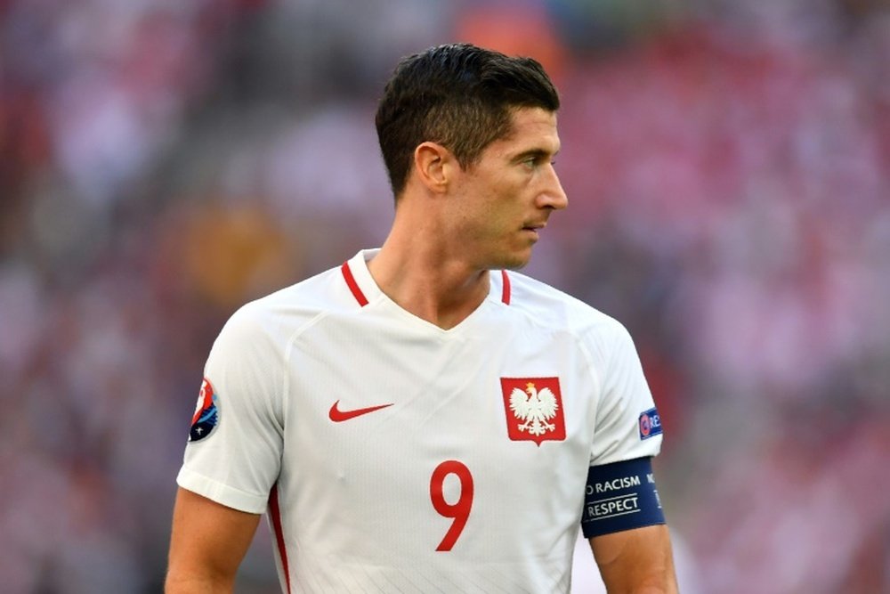 Polands forward Robert Lewandowski reacts during the Euro 2016 match between Ukraine and Poland at the Velodrome stadium in Marseille on June 21, 2016
