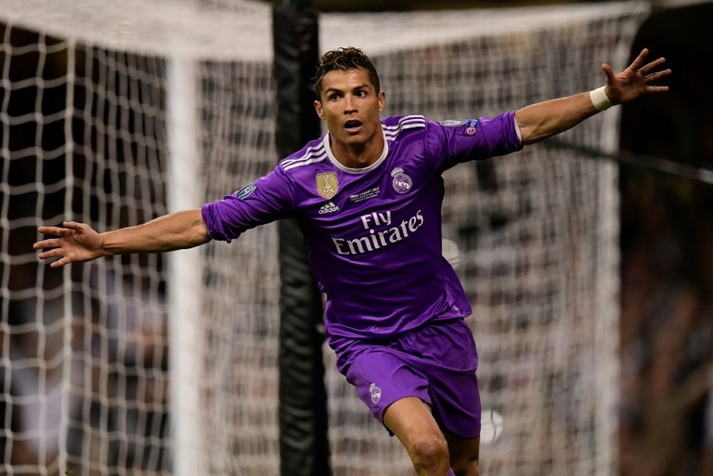 L'attaquant du Real Madrid, Cristiano Ronaldo, célèbre son doublé en finale de C1. AFP