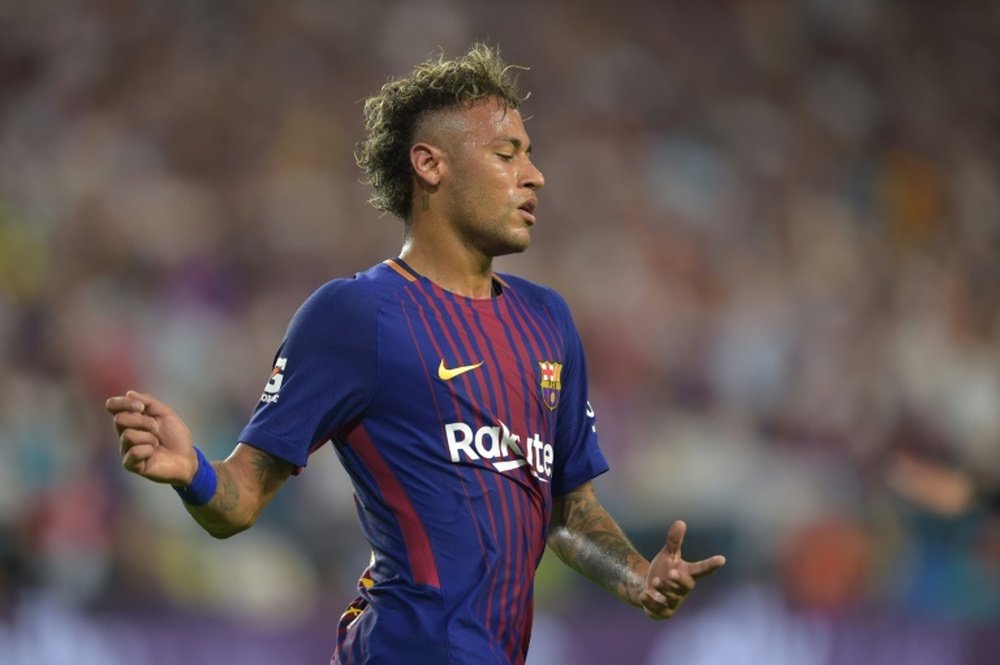 Neymar estava envolvido em processo movido pelo Santos contra o Barcelona. AFP