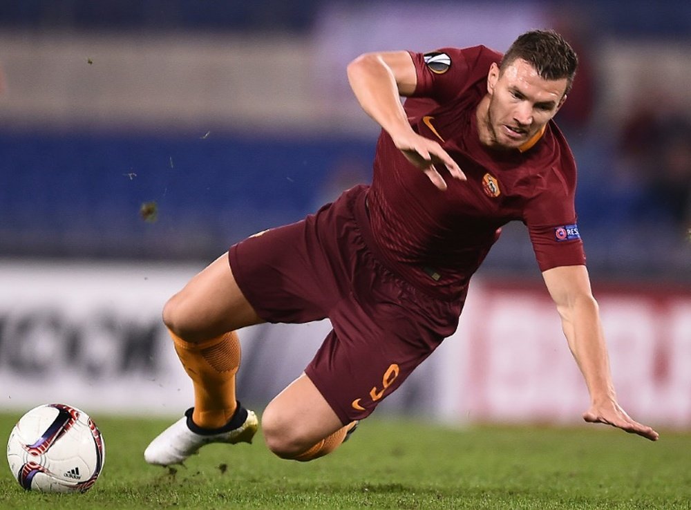 Romas Edin Dzekofired a series of blanks as Roma were held to a scoreless draw at Empoli. AFP