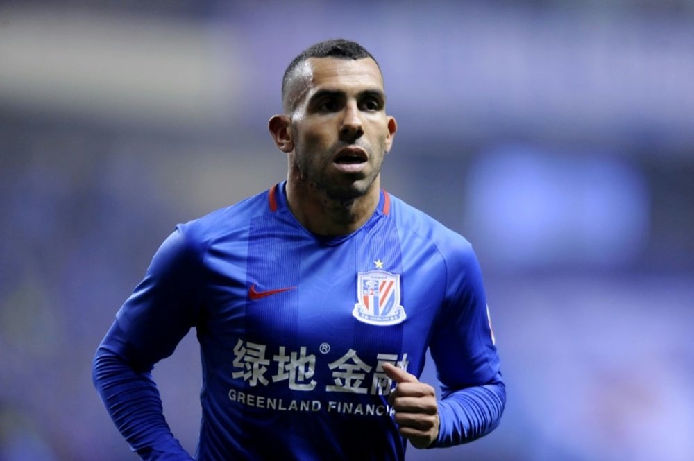 Carlos Tevez is expected to return to China. AFP