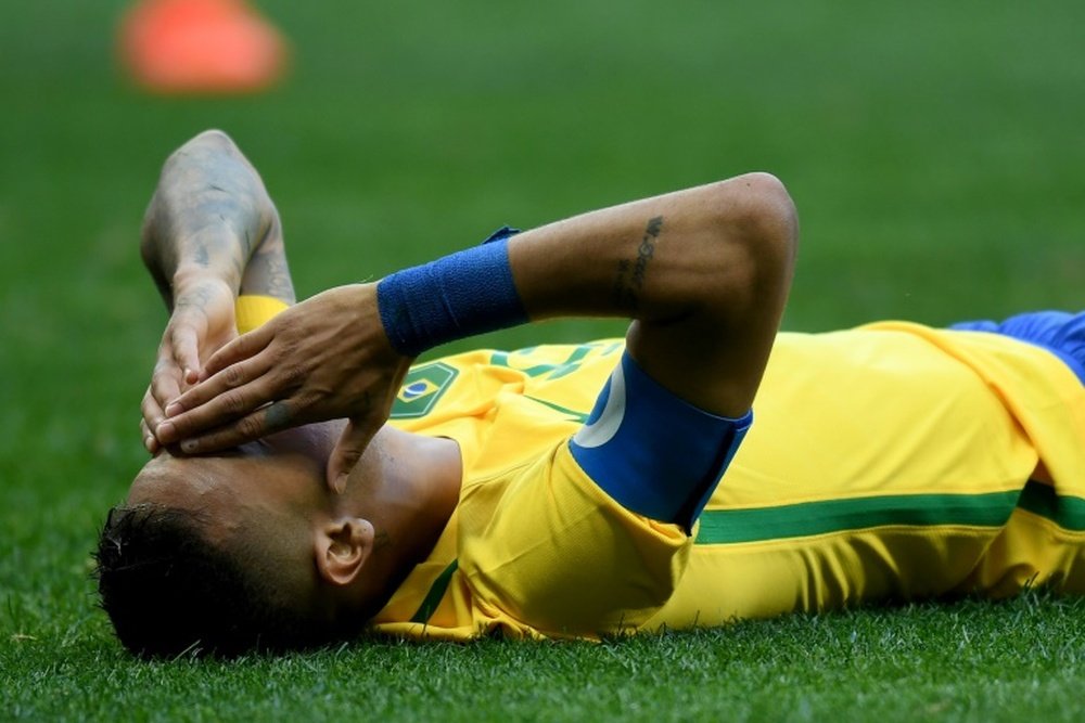 Brazil player Neymar gestures on the field during the Rio 2016 Olympic Games First Round Group A mens football match Brazil vs South Africa, at the Mane Garrincha Stadium in Brasilia on August 4, 2016