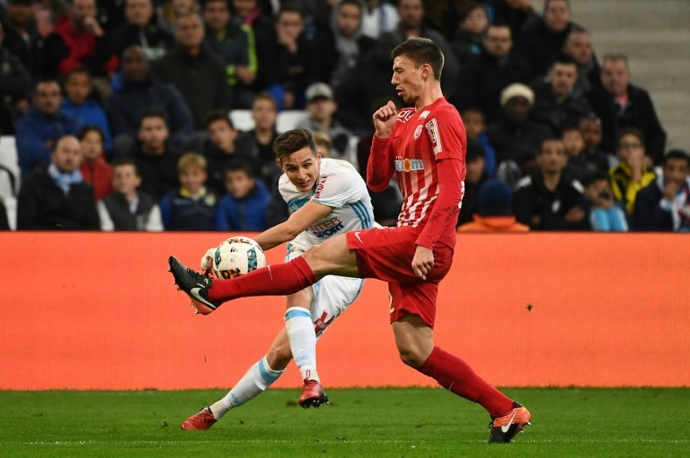 Marseille midfielder Florian Thauvin (L) opened the scoring against Nancy. AFP