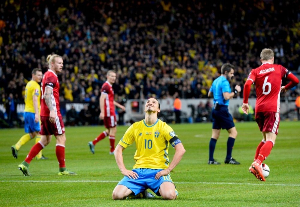 Swedens forward and team captain Zlatan Ibrahimovic reacts during the Euro 2016 play-off football match between Sweden and Denmark in Solna on November 14, 2015