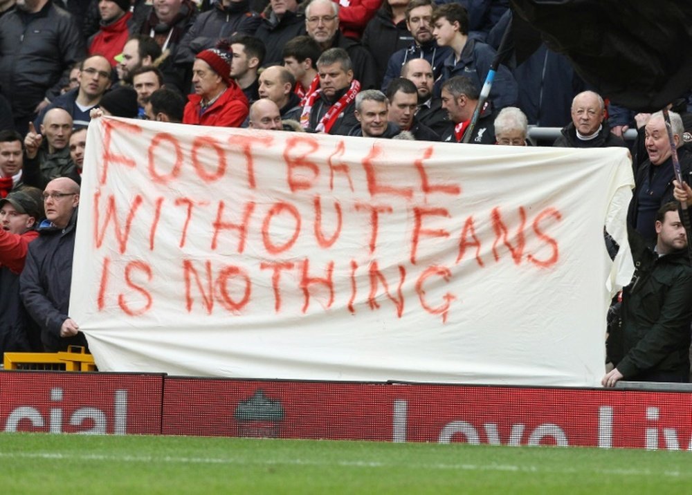 Liverpool fans hold a banner as they protest against the recently announced rise in ticket prices during the English Premier League football match between Liverpool and Sunderland at Anfield in Liverpool, northwest England, on February 6, 2016