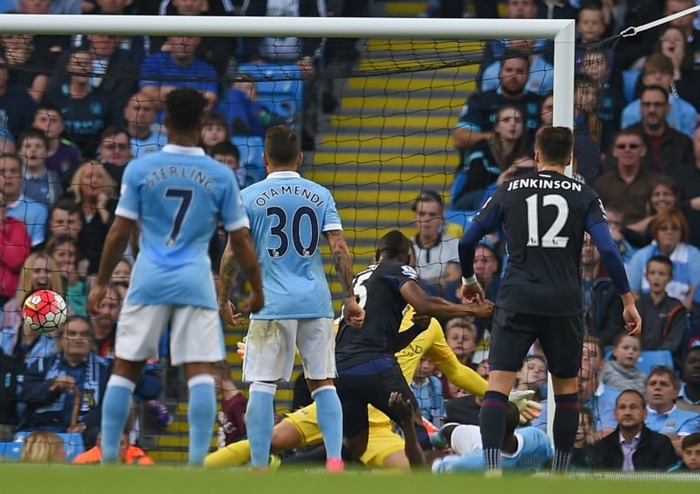 West Ham Uniteds striker Diafra Sakho (3rd L) scores past Manchester Citys goalkeeper Joe Hart (2nd R) during an English Premier League football match at The Etihad Stadium in Manchester, north west England on September 19, 2015