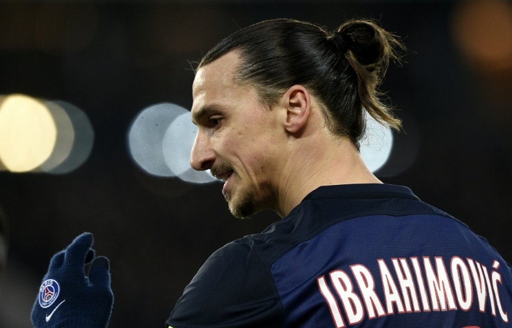 Paris Saint-Germains forward Zlatan Ibrahimovic celebrates after scoring a goal during the match against Angers on January 23, 2016 at the Parc des Princes stadium in Paris