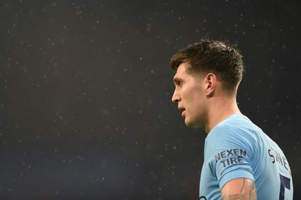 John Stones believes that adapting to Guardiola's philosophy has become second nature. AFP