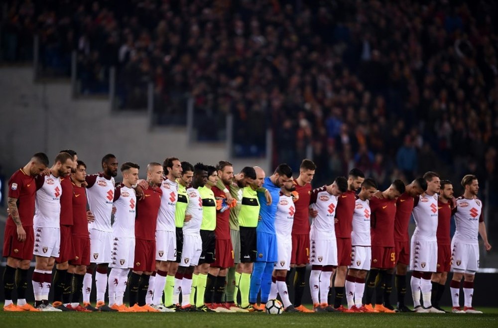 Astori honoured as former club Roma beat Torino. AFP