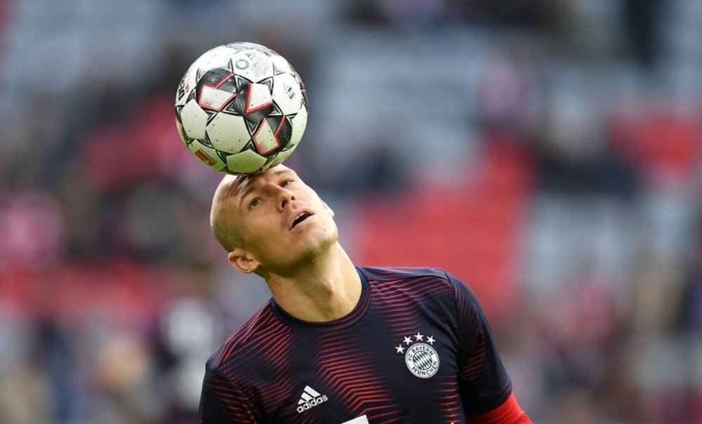 Robben pode voltar a jogar em gramados brasileiros. AFP