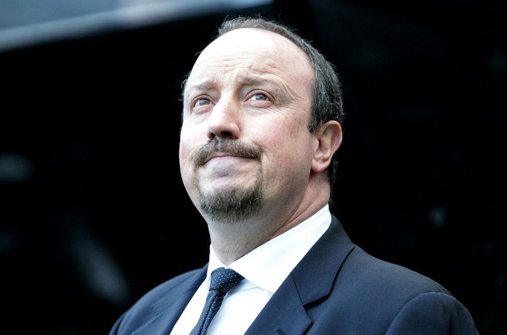 Benitez is hoping to cause an upset at Old Trafford. AFP