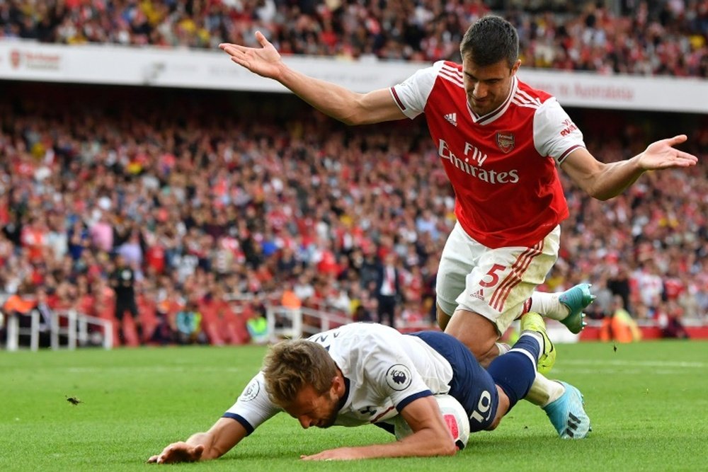 Sokratis (R) is on Liverpool's radar. AFP