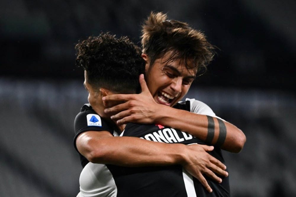 Argentino y luso ya llevan dos años jugando juntos en Turín. AFP