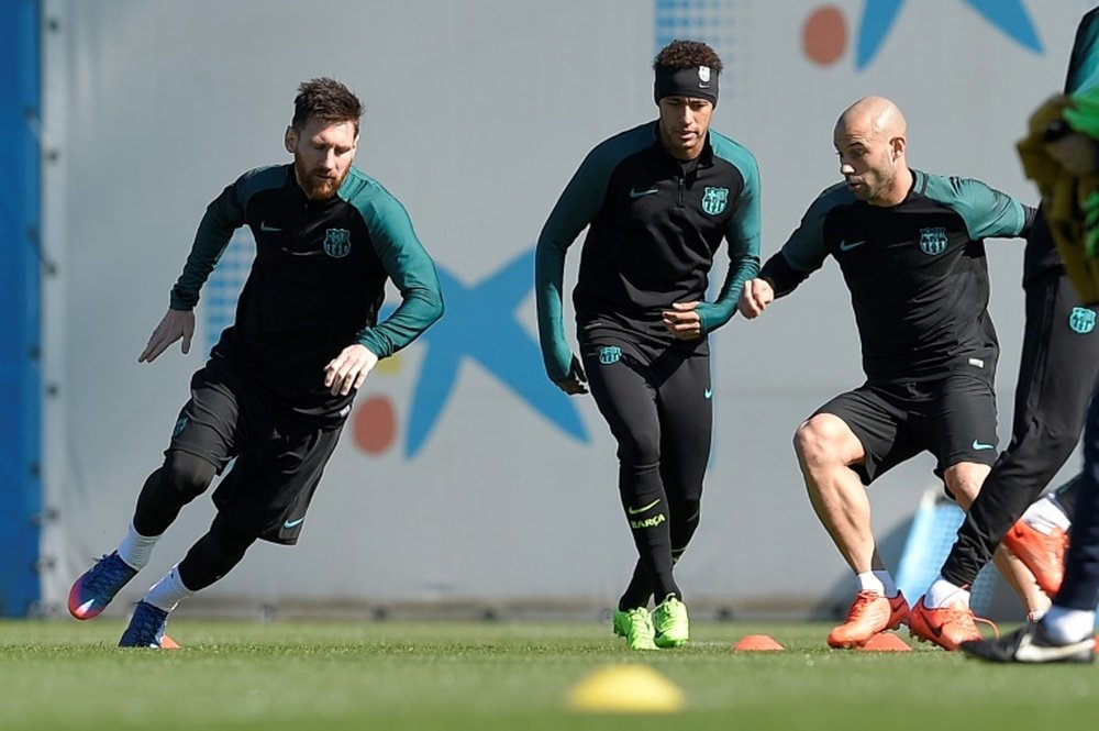 Messi, Neymar and Mascherano during training today. AFP