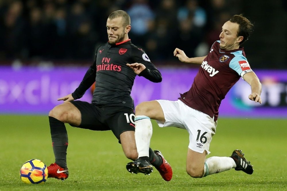 Edmilson has been pushed out of the team by Jack Wilshere and Mark Noble. AFP