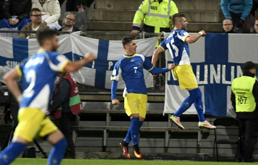 Valon Berisha of Kosovo (R) celebrates after scoring against Finland in Turku on September 5, 2016
